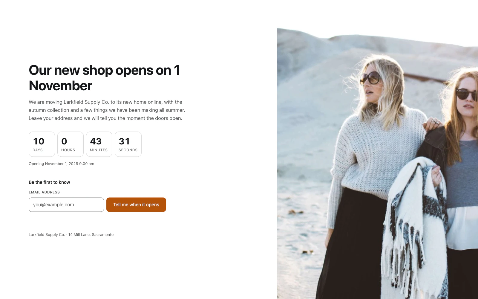 A coming soon page in the Split design. On the left, the headline Our new shop opens on 1 November, a short message, a countdown of 10 days, 0 hours, 43 minutes and 31 seconds with the line Opening November 1, 2026 9:00 am, and a sign-up form headed Be the first to know with an email field and a Tell me when it opens button. A photograph of two friends in knitwear fills the right half.