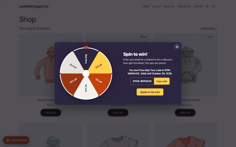 The same popup after a spin, with the pointer on the Free ship slice. The text reads: You won Free ship! Your code is SPIN-MDPAUCK. Valid until October 29, 2026. Below it are the code with a Copy code button and an Apply to my cart button.